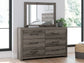 Graystorm King Panel Bed with Mirrored Dresser and Nightstand