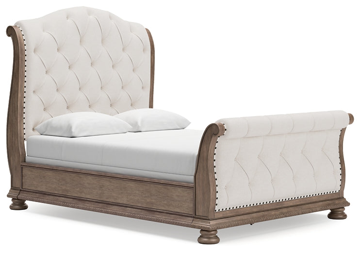 Ardenfield Queen Upholstered Sleigh Bed with Mirrored Dresser and Nightstand