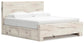 Lawroy King Panel Bed with Storage, Dresser, Mirror, Chest and Nightstand
