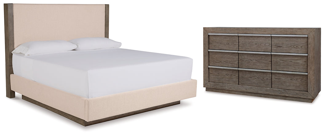 Anibecca Queen Upholstered Panel Bed with Dresser